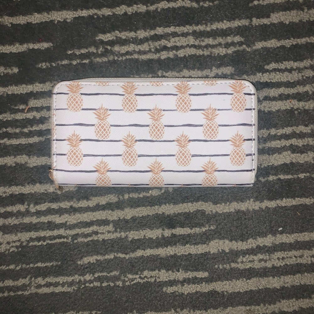White Wallet with pineapples on it